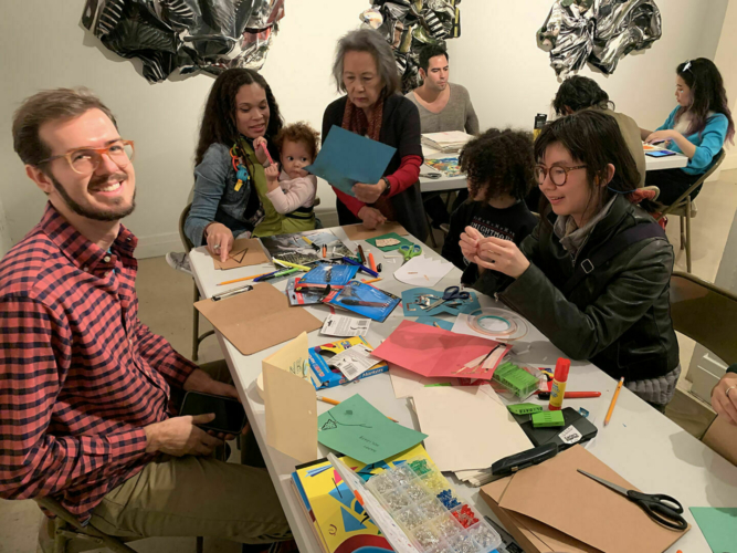 Participants attend LA Artcore’s annual holiday open house, December 2019.